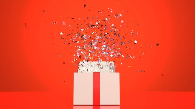 The gift box opens and colored confetti floats up