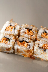 Sushi rolls. Japanese food in restaurant. Sushi roll set with salmon, vegetables and rice. Asian food concept. Japanese cuisine.