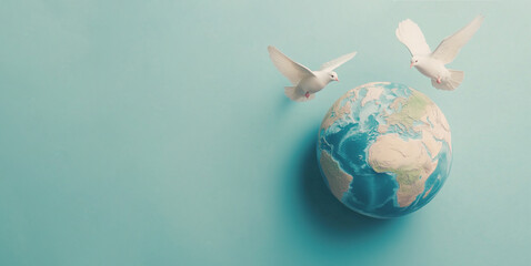 Fototapeta premium Dove flying around planet earth, international peace day, faith, freedom, charity and help concept, humanitarian aid