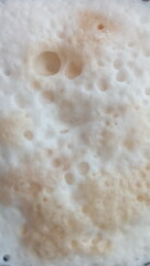 creamy coffee foam, close-up photography, soft texture