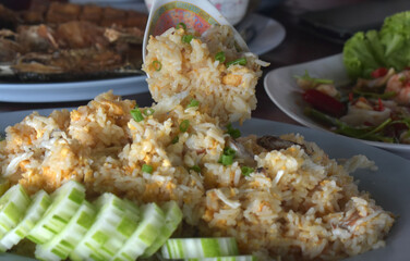Seafood, spicy shrimp and squid salad and fried rice