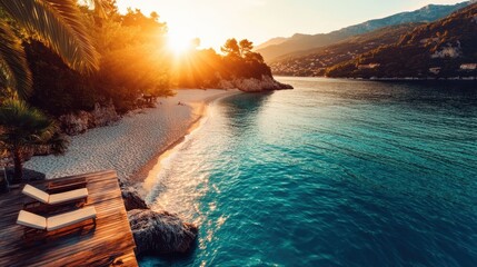 A serene sunset over a peaceful beach, highlighted by warm orange hues, wooden deck chairs facing the sea, and a gently curving shoreline in the soft evening light.