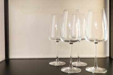 wine glasses on a shelf