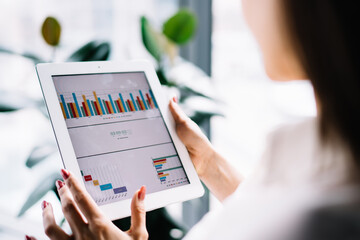 Female using tablet at workplace