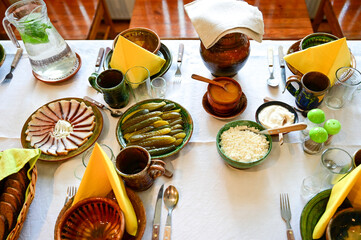 Traditional Latvian table setting with bread, bacon, pickles and soup as lunch for visitors to the Aglona Bread Museum, Aglonas Maizes muzejs in Aglona, ​​Latvia