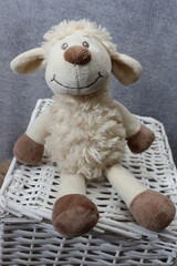 toy sheep on a blue background