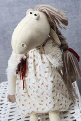 handmade doll with a toy