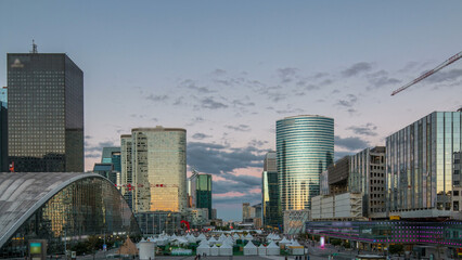 The stunning Defence Parisian business district bristling with skyscrapers day to night timelapse.