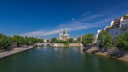 Obraz premium Seine and Notre Dame de Paris timelapse hyperlapse is the one of the most famous symbols of Paris