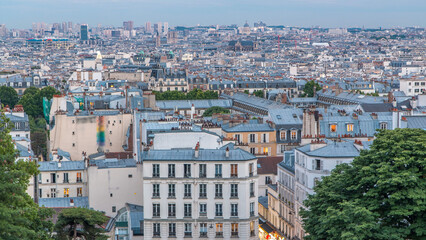 Fototapeta premium Beautiful Paris cityscape day to night timelapse seen from Montmartre. Paris, France