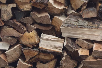 Fotobehang Brandhout Stacked Firewood Logs with Natural Wood Texture  © Pat4U