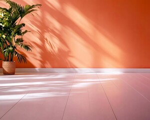 Indoor plant against orange wall, natural light
