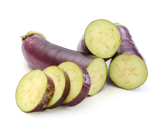 Aubergine, Solanum melongena, egg plant, single ripe fruit and halved fruit next to it - stock photo	
