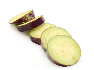 Aubergine, Solanum melongena, egg plant, single ripe fruit and halved fruit next to it - stock photo	
