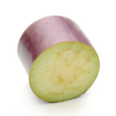 Aubergine, Solanum melongena, egg plant, single ripe fruit and halved fruit next to it - stock photo	
