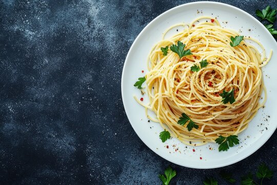 Top View of Classic Spaghetti Aglio e Olio with Fresh Parsley on White Plate, Perfect for Italian Cuisine, Simple Pasta Dishes, and Comfort Food Concepts