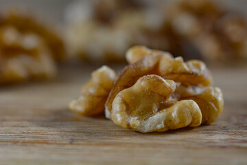 Concept photo of a peeled walnut close-up