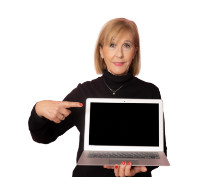 Senior woman showing laptop computer screen isolated over transparent background. PNG transparent.