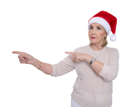 Mature woman wearing santa hat pointing fingers side isolated over transparent background. PNG transparent. - Powered by Adobe