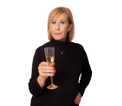 Smiling mature woman drinking champagne standing over transparent background. Celebration concept. PNG transparent.