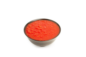 Tomato sauce in a ceramic bowl on a white background