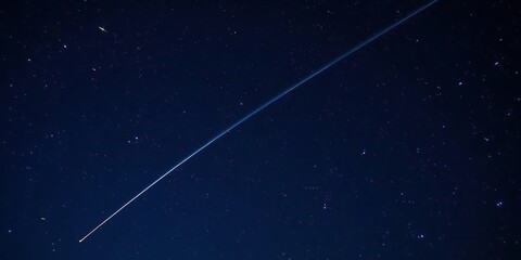 Night sky with a stunning starry sky and a shooting star streaking across it, cosmic ray, dark matter