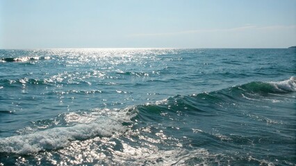 Shimmering waves on a calm ocean surface, sea, gentle waves
