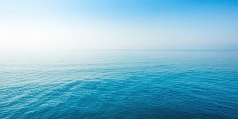 Obraz premium A serene blue gradient background with subtle texture, evoking a sense of calmness and tranquility, blues, gradient, misty, ambient