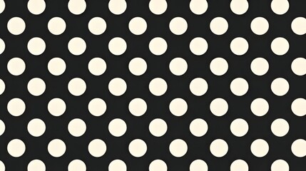 A seamless pattern of black and white polka dots, adding a playful touch to designs