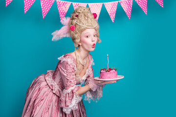 Photo of pretty cute princess medieval lady dressed victorian era garment birthday cake isolated on blue color background