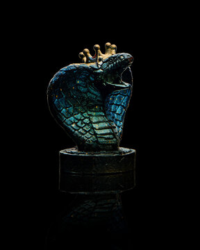 Blue with gold glitter chocolate snake on black