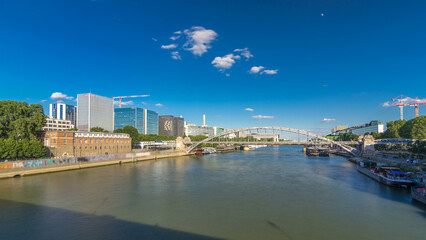 Obraz premium The Austerlitz viaduct in Paris timelapse hyperlapse, seen from bank of the river Seine with a metro train passing