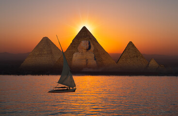 Beautiful Nile scenery with traditional Felluca sailing boat in the Nile on the way to Giza...