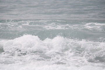 waves with foam on the sea