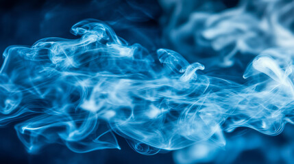 Obraz premium Mysterious blue smoke swirling against dark background for abstract art design