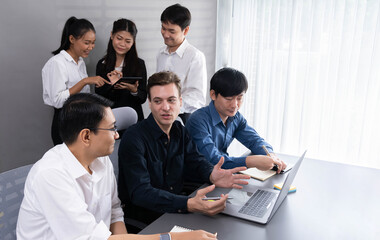 Group of diverse office worker employee working together on strategic business marketing planning in corporate office room. Positive teamwork in business workplace concept. Prudent