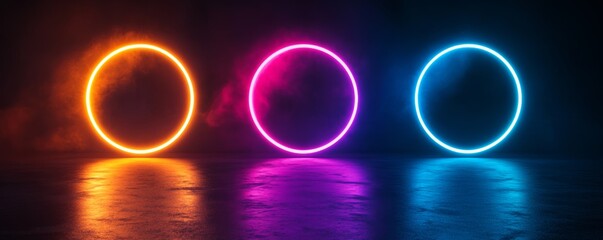Three glowing neon circles creating vibrant reflections on wet asphalt