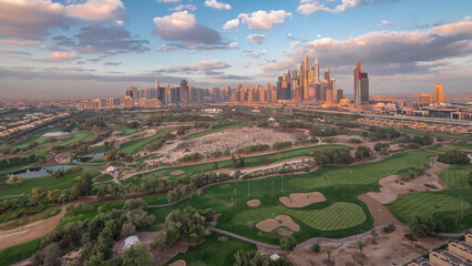 Dubai Marina skyscrapers and golf course morning timelapse, Dubai, United Arab Emirates