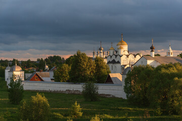 Fototapeta premium Panoramic view of the Pokrovsky Monastery in Suzdal at sunset. Russia. Summer landscape. High quality photo