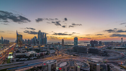 Dubai Media City with Modern buildings aerial day to night timelapse, United Arab Emirates
