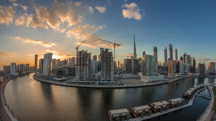 Obraz premium Dubai city center at sunset near river aerial timelapse