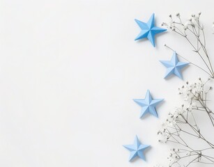 Obraz premium White background with blue stars and confetti arranged in a frame