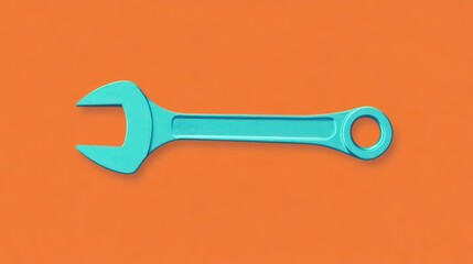 A simple, flat design of a wrench outlined in teal against a bright orange background, ideal for representing tools or DIY projects