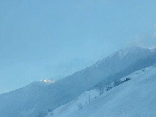 winter landscape with snow covered trees in the mountains. Tranquille scenery