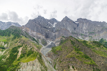Beautiful himalayan mountain with bodhunaag glacier & waterfall in the evening at raling in Lahaul, 
leh manali highway himachal pradesh, India