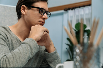 Stressful office worker concentrating business report on pc, analyzing market strategy planning to...