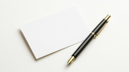 Elegant Black Pen Resting Next to a Blank White Card on a Minimalist Surface Ideal for Creative Ideas, Notes, or Professional Presentation