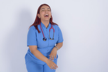 Latina doctor laughing out loud, white background