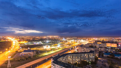 Fototapeta premium Park named after the First President of the Republic of Kazakhstan in the city of Aktobe day to night timelapse. Western Kazakhstan.