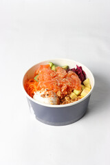Salmon poke bowl in a studio setting